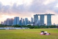 2019 March 1st, Singapore, Marina Barrage - Panorama view of the city buildings and people doing their activities at sunset Royalty Free Stock Photo