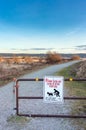 March 18, 2019 - Surrey, BC: Sign warning dog owners to pick up pet`s waste.