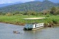 March 6 2023 - Tarcoles, Costa Rica: People enjoy a wildlife Excursion by boat on Rio Tarcoles