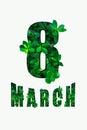 8 MARCH text on white background. Green leaves background.