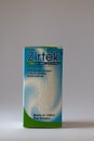 Zirtek bottle container, a potent second-generation antihistamine used in the treatment of hay fever, allergies, and urticaria Royalty Free Stock Photo