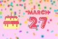 march 27th. Day 27 of month,Birthday greeting card with date of birth and birthday cake. spring month, day of the year concept