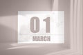 march 01. 01th day of the month, calendar date. White sheet of paper with numbers on minimalistic pink background with