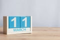 March 11th. Day 11 of month, wooden color calendar on table background. Spring day, empty space for text Royalty Free Stock Photo