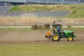 2017 March 19. Tokyo Japan. A worker man cleaning soil ground by tracktor car to preapre for agriculture