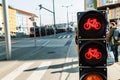 Traffic light for bicyclists on city street background