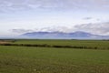 A view of the Mourne Mountains with their cloud covered peaks. Viewed across Dundrm Bay