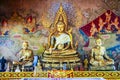 Big Gold buddha and gold monk status in buddhist temple and hist Royalty Free Stock Photo