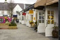 A woman laden with carrier bags while enjoying some retail therapy at the up market Kildare Village shopping outlet in County Kil Royalty Free Stock Photo