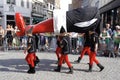 2Marchers carrying giant leg in The 2012 Procession of the Golden Tree Pageant, held every 5 years since 1958.
