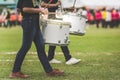 Marching band drummers perform in school