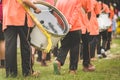 Marching band drummers perform in school parade