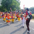 Marching Band Of Elementary School Students With Colorful Costumes Royalty Free Stock Photo