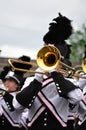 Marching Band Performer Playing Trombone in Parade Royalty Free Stock Photo