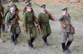 Marching Russian soldiers-reenactors. Osovets battle reenactment