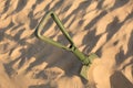Marching shovel. shovel in the sand. green shovel Royalty Free Stock Photo