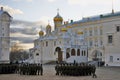 Marching soldiers and Annunciation church of Moscow Kremlin Royalty Free Stock Photo