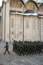 Marching soldiers and Dormition church of Moscow Kremlin Royalty Free Stock Photo