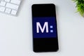 Marcus by Goldman Sachs app logo on a smartphone screen.