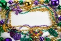 Mardi gras beads frame isolated on white background Royalty Free Stock Photo