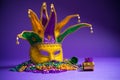 Mardi Gras or Carnivale mask on purple