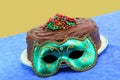 Mardi Gras Chocolate Doberge Cake with Mask Royalty Free Stock Photo