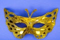 Mardi Gras Festival. Luxurious masquerade Venetian carnival mask on purple background
