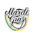 Mardi Gras hand lettering with colorful beads isolated on white. Fat or Shrove Tuesday sign. Traditional carnival in New Orlean.