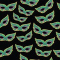 Mardi Gras masks seamless pattern. Cartoon doodle background. Vector illustration Royalty Free Stock Photo