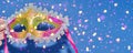 Mardi Gras masquerade mask on blue background with confetti Royalty Free Stock Photo