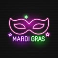 Mardi Gras Masquerade Mask. Shiny Neon Lamps Glow Stylization on Black Brick Wall. Venetian Carnival, Playbill, Night Club