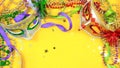 Mardi Gras overhead background with colorful masks and beads