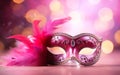 Mardi Gras poster. Banner template with a photorealistic Venetian carnival mask for women, pink feathers