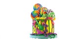 Mardi Gras theme on-trend candyland fantasy drip cake. Royalty Free Stock Photo
