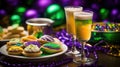 Mardi Gras Treats food and drinks in purple, green, yellow colors background. Masquerade festival carnival masks, gold Royalty Free Stock Photo