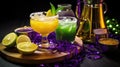 Mardi Gras Treats food and drinks in purple, green, yellow colors background. Masquerade festival carnival masks, gold Royalty Free Stock Photo