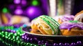 Mardi Gras Treats food and drinks in purple, green, yellow colors background. Masquerade festival carnival masks, gold Royalty Free Stock Photo