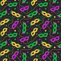 Mardi Gras vector seamless pattern with carnival masks and beads. Royalty Free Stock Photo