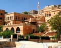 Mardin historical city center with museum building and minaret in background in Turkey
