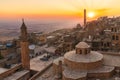 Old city of Mardin cityscape with roof of a Turkish hammam and minarets, Mardin, Turkey