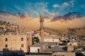 Sehidiye mosque and its minaret with old Mardin cityscape, Mardin, Turkey