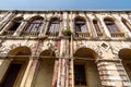 Low angle shot of the arches and windows of the ancient Municipal building in Madgaon