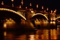 The Margaret bridge in Budapest with reflections on the water. closeup view.