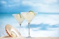 Margarita cocktail on beach, blue sea and sky ocean Royalty Free Stock Photo