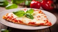 Margherita Italian pizza with melted mozzarella cheese and tomato garnished with fresh basil on a thick crust