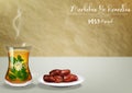 Marhaban ya Ramadhan. Iftar party celebration with traditional tea cup and a bowl of dates