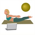 Beautiful sporty blonde woman practicing sarpasana pose - in front of her laptop, wearing sport blue outfit. Viparita Yoga pose