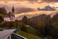 Maria Gern pilgrimage church and mount Watzmann top silhouette through fog, Berchtesgaden, Germany Royalty Free Stock Photo