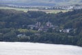 Maria Laach at Laacher See with the hill top village Bell above Royalty Free Stock Photo