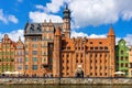 Mariacka Gate and Archeological Museum along the Hanseatic houses pier at Motlawa river embankment in old town city center in Royalty Free Stock Photo